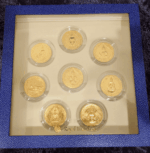 A set of 8 commemorative coins, 8 days of birth, made of cupronickel, gold plated, packed in a leather box with a certificate from the Treasury Department. - Image 2