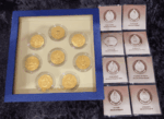 A set of 8 commemorative coins, 8 days of birth, made of cupronickel, gold plated, packed in a leather box with a certificate from the Treasury Department. - Image 5