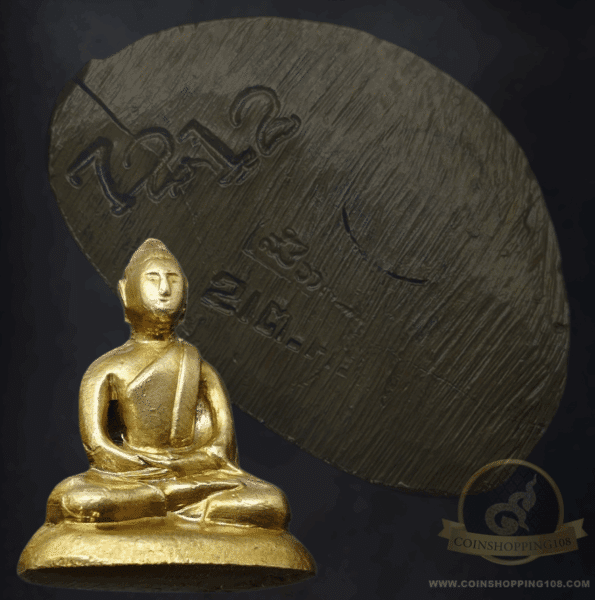 A Phra Kring amulet, handcrafted by Her Majesty Queen Mother Sirikit, made of mixed gold alloy, dated 2515 BE (1972 AD). Beautiful form, easily verifiable as authentic, and rare in material.